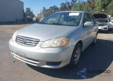 2004 Toyota Corolla Le z USA, uszkodzony, nr VIN 1NXBR32E24Z300903